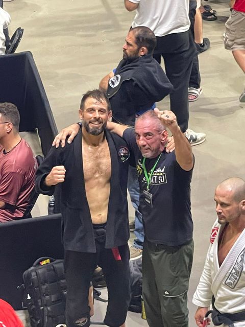 Venice BJJ team celebrating after a tournament match